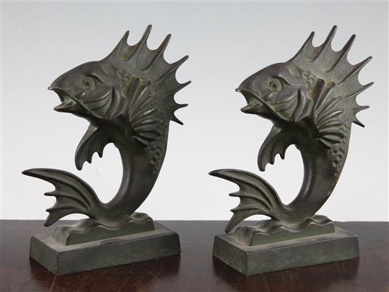 A pair of French Art Deco patinated bronze bookends, 7.75in.